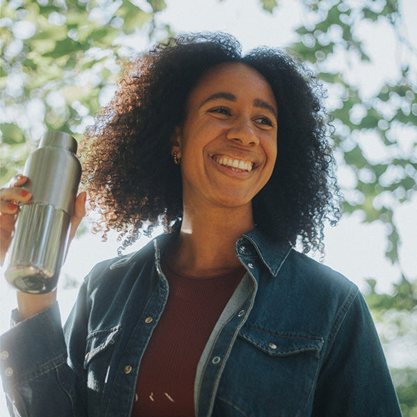 bring-your-own-party-kit-tumblers-and-cocktails-k9 16oz_rise_reflect_woman_smile_square.jpg