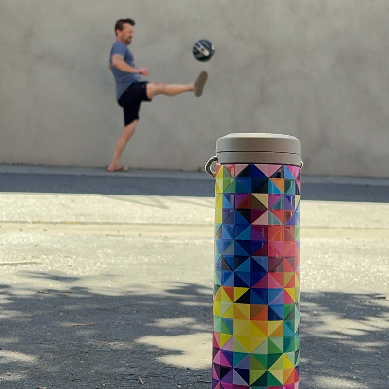 20oz-tkwide-with-twist-cap-mosaic-f4 20oz_tkwide_bottle_seasonal_mosaic_soccerball_player_square.jpg