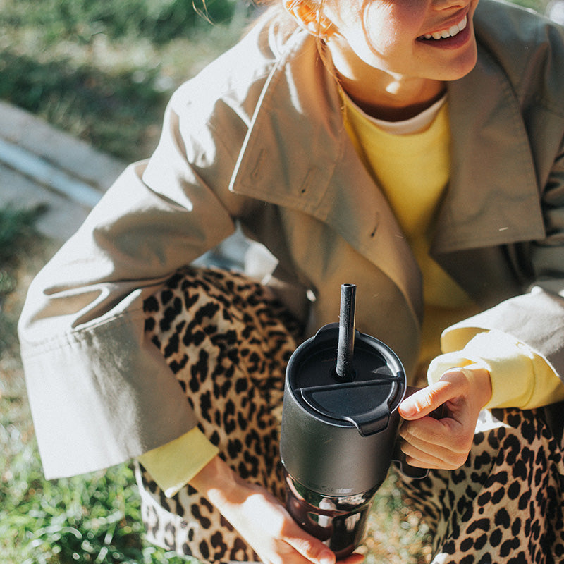 26oz-rise-tumbler-with-straw-lid-u6 26oz_rise_tumbler_black_woman_topview_square.jpg