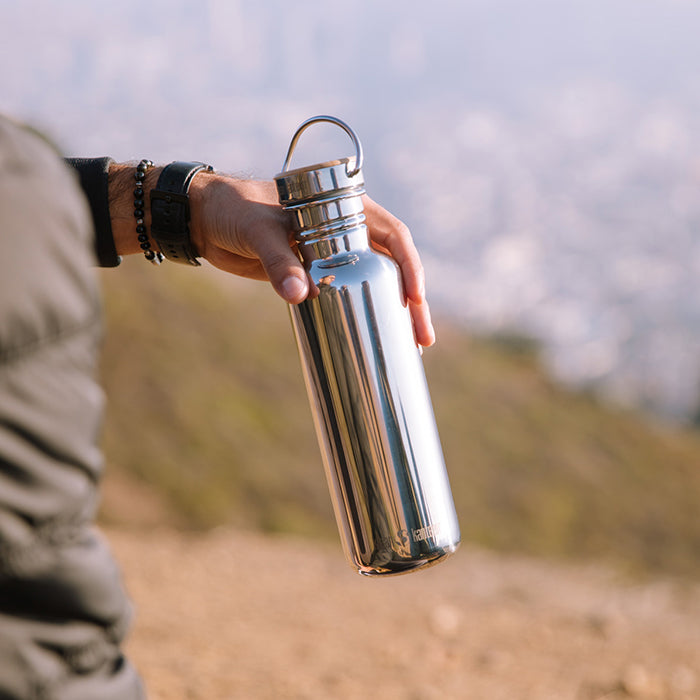 27oz-reflect-with-bamboo-cap-r0 K27SSLRF-MS-BAMBOO_reflect_bottle_hand_lifestyle.jpg