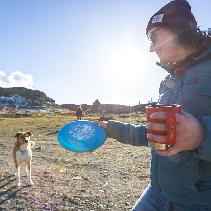 12oz-camp-mug-m7 insulated_camp_mug_12oz_woman_dog_frisbee_square.jpg