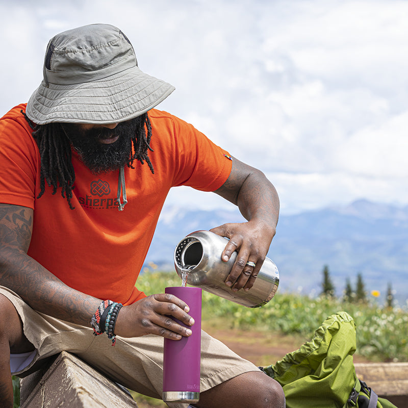 64oz-tkwide-with-loop-cap-b0 tkwide_64oz_bottle_backpacker_mountains_filling_square.jpg