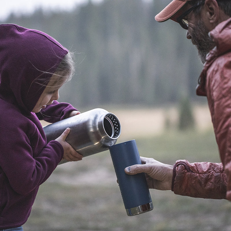 64oz-tkwide-with-loop-cap-b0 tkwide_64oz_bottle_girl_dad_filling_square.jpg